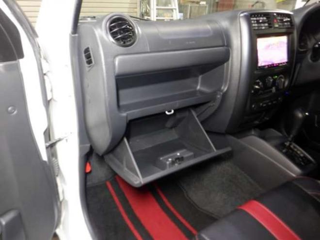 ジムニーワイルドウインド 4WD　本州仕入・ナビ・TV・Bカメラ・専用レザーシート・ETC・キーレス・シートヒーター・フォグランプ・ターボ・純正AW・電動格納ミラー・ミラーヒーター・ルーフレール 660