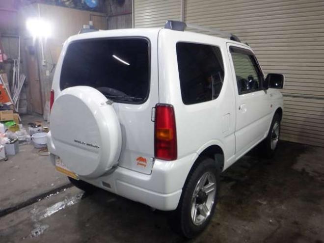 ジムニーワイルドウインド 4WD　本州仕入・ナビ・TV・Bカメラ・専用レザーシート・ETC・キーレス・シートヒーター・フォグランプ・ターボ・純正AW・電動格納ミラー・ミラーヒーター・ルーフレール 660