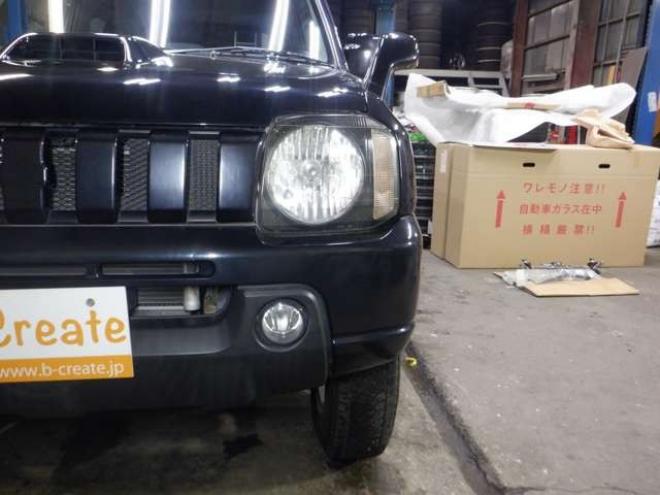 ジムニーワイルドウインド 4WD　本州仕入・ナビ・フルセグTV・キーレス・フォグランプ・シートヒーター・ミラーヒーター・ルーフレール・ターボ・社外AW・ライトレベライザー・電動格納ミラー・DVD再生・JAOSマッドガード 660
