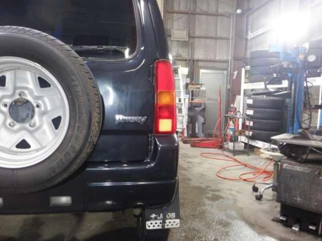 ジムニーワイルドウインド 4WD　本州仕入・ナビ・フルセグTV・キーレス・フォグランプ・シートヒーター・ミラーヒーター・ルーフレール・ターボ・社外AW・ライトレベライザー・電動格納ミラー・DVD再生・JAOSマッドガード 660