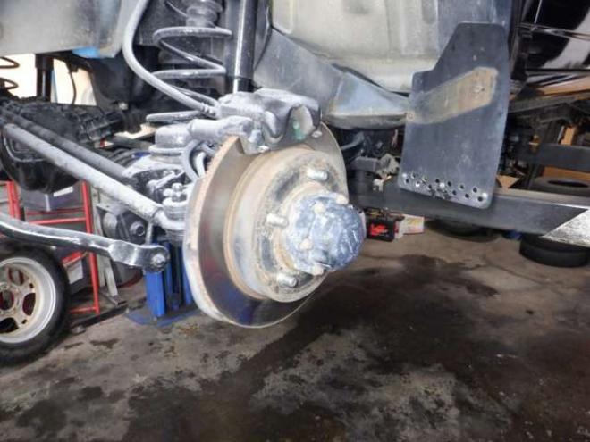 ジムニーワイルドウインド 4WD　本州仕入・ナビ・フルセグTV・キーレス・フォグランプ・シートヒーター・ミラーヒーター・ルーフレール・ターボ・社外AW・ライトレベライザー・電動格納ミラー・DVD再生・JAOSマッドガード 660