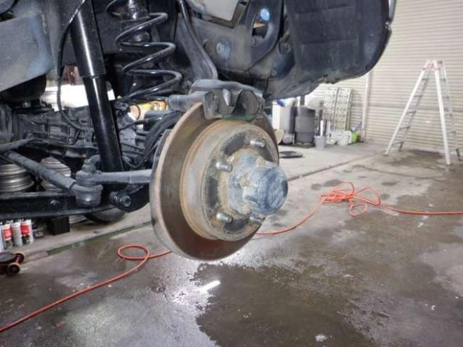 ジムニーワイルドウインド 4WD　本州仕入・ナビ・フルセグTV・キーレス・フォグランプ・シートヒーター・ミラーヒーター・ルーフレール・ターボ・社外AW・ライトレベライザー・電動格納ミラー・DVD再生・JAOSマッドガード 660