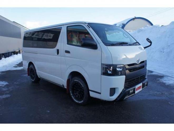 ハイエースバン2.8 DX ロング GLパッケージ ディーゼルターボ 4WD　Bカメラ　TRDフロントスポイラー　マッドフラップ　エセックス16インチアルミ　オープンカントリーRT　LEDヘッドライト　Wエアバッグ　AC100V　8人乗り構造変更済　寒冷地仕様　リアヒーター&エアコン 2800