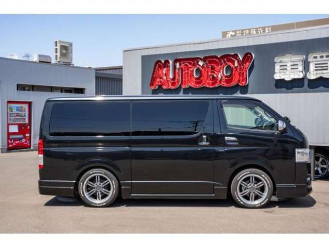 ハイエースバン2.8ダークプライム マルチロールトランスポータータイプIIロング ディーゼルターボ4WD　モデリスタフルエアロ・415COBRAバッドラッカー18インチAW・純正SDナビTV・Bカメラ・両側パワスラ・LEDライト・スマキー・AC100V・ベッドキット・エンスタ 2800