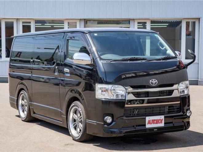ハイエースバン2.8ダークプライム マルチロールトランスポータータイプIIロング ディーゼルターボ4WD　モデリスタフルエアロ・415COBRAバッドラッカー18インチAW・純正SDナビTV・Bカメラ・両側パワスラ・LEDライト・スマキー・AC100V・ベッドキット・エンスタ 2800