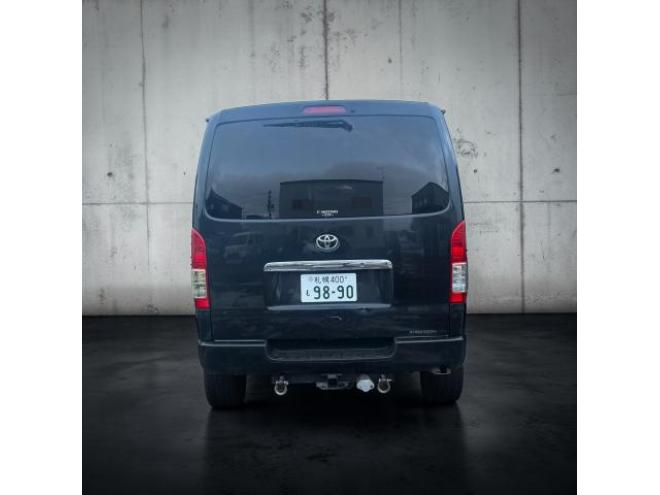 ハイエースバン4型フェイス スーパーGL ディーゼルターボ 本州車寒冷地仕様 ナビTVバックカメラ 両側スライドドア リアテーブルドリンクホルダー ベッドキット モデリスタフロントリップ LEDヘッドライト ヒッチメンバー 運転席レカロシート ヴァレンティーテールランプ 車検満タン 即乗りOK！ 4WD 3000 5Dr