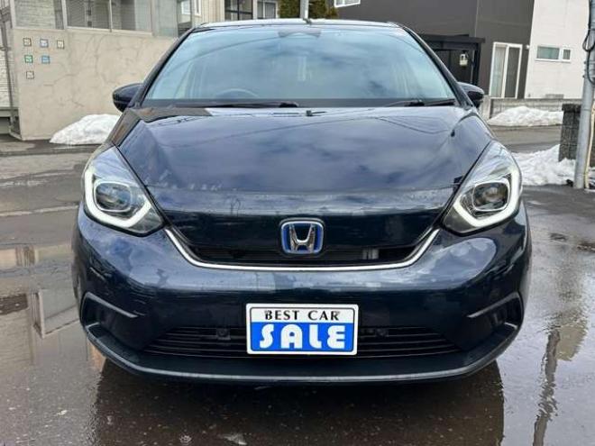 フィット1.5 e:HEV ホーム 4WD　純正ナビ　Bluetooth　バックカメラ　クルーズコントロール　コーナーセンサー　ハーフレザーシート　ETC　ミラーヒーター　横滑り防止装置　ブレーキホールド　USB前後　社外アルミホイール夏 1500