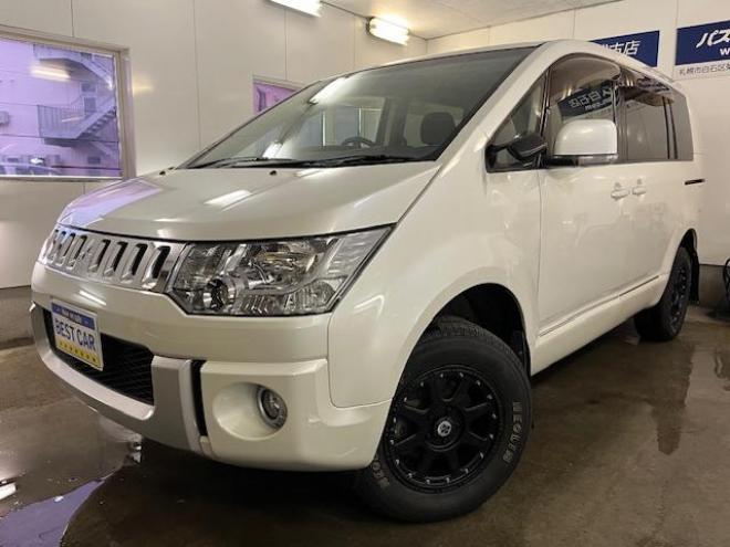 デリカＤ：５　Ｇパワーパッケージ　本州仕入　寒冷地仕様　禁煙車　両側パワースライドドア　エクストリーム１６インチＡＷ＋ＮＥＯＬＩＮホワイトレター　新品ＪＡＯＳブラックマッドガード　アルパイン製リアグリップダウンモニター　ストラーダナビ 4WD 2400 5Dr