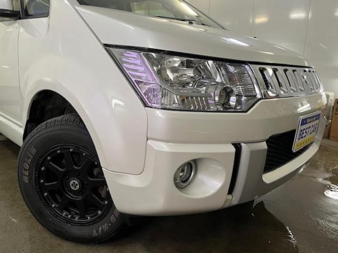 デリカＤ：５　Ｇパワーパッケージ　本州仕入　寒冷地仕様　禁煙車　両側パワースライドドア　エクストリーム１６インチＡＷ＋ＮＥＯＬＩＮホワイトレター　新品ＪＡＯＳブラックマッドガード　アルパイン製リアグリップダウンモニター　ストラーダナビ 4WD 2400 5Dr