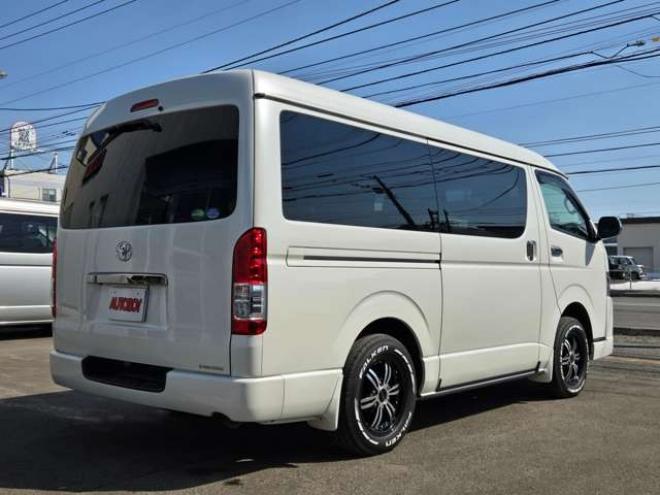 ハイエースバン2.7 スーパーGL ダークプライム ワイド ミドルルーフ ロングボディ 4WD　寒冷地仕様　パワスラ　リアヒーター&クーラー　プッシュスタート　スマートキー　ウッドコンビステアリング&シフトノブ　ハーフレザーシート　ドラレコ　バックカメラ　ETC　メモリナビ　フルセグTV　Bluetooth 2700