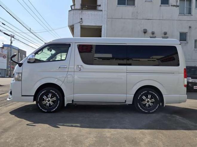 ハイエースバン2.7 スーパーGL ダークプライム ワイド ミドルルーフ ロングボディ 4WD　寒冷地仕様　パワスラ　リアヒーター&クーラー　プッシュスタート　スマートキー　ウッドコンビステアリング&シフトノブ　ハーフレザーシート　ドラレコ　バックカメラ　ETC　メモリナビ　フルセグTV　Bluetooth 2700