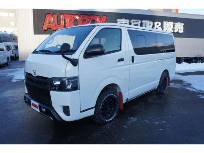 ハイエースバン2.8 DX ロング GLパッケージ ディーゼルターボ 4WD　Bカメラ　TRDフロントスポイラー　マッドフラップ　エセックス16インチアルミ　オープンカントリーRT　LEDヘッドライト　Wエアバッグ　AC100V　8人乗り構造変更済　寒冷地仕様　リアヒーター&エアコン 2800