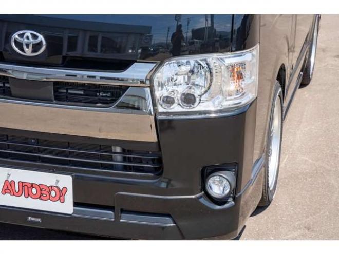 ハイエースバン2.8ダークプライム マルチロールトランスポータータイプIIロング ディーゼルターボ4WD　モデリスタフルエアロ・415COBRAバッドラッカー18インチAW・純正SDナビTV・Bカメラ・両側パワスラ・LEDライト・スマキー・AC100V・ベッドキット・エンスタ 2800