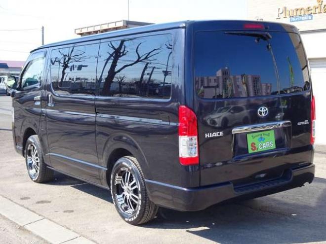 ハイエースバン3.0 スーパーGL ダークプライム ロングボディ ディーゼルターボ 4WD　本州車　4WD　3.0ディーゼルターボ　ダークプライム　新品タイミングベルト/ウォーターポンプ交換込　DELF&NASCARホワイトレタータイヤ　バックカメラ　本革巻黒木目ハンドル　メッキグリル　LEDヘッドライト ETC 3000