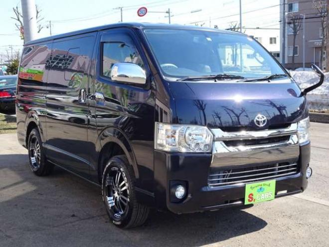 ハイエースバン3.0 スーパーGL ダークプライム ロングボディ ディーゼルターボ 4WD　本州車　4WD　3.0ディーゼルターボ　ダークプライム　新品タイミングベルト/ウォーターポンプ交換込　DELF&NASCARホワイトレタータイヤ　バックカメラ　本革巻黒木目ハンドル　メッキグリル　LEDヘッドライト ETC 3000