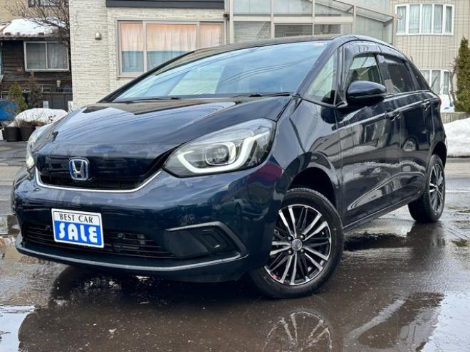 フィット1.5 e:HEV ホーム 4WD　純正ナビ　Bluetooth　バックカメラ　クルーズコントロール　コーナーセンサー　ハーフレザーシート　ETC　ミラーヒーター　横滑り防止装置　ブレーキホールド　USB前後　社外アルミホイール夏 1500