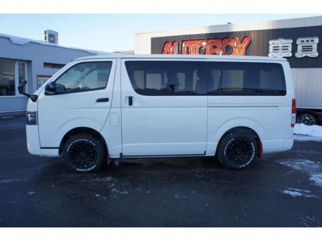 ハイエースバン2.8 DX ロング GLパッケージ ディーゼルターボ 4WD　Bカメラ　TRDフロントスポイラー　マッドフラップ　エセックス16インチアルミ　オープンカントリーRT　LEDヘッドライト　Wエアバッグ　AC100V　8人乗り構造変更済　寒冷地仕様　リアヒーター&エアコン 2800