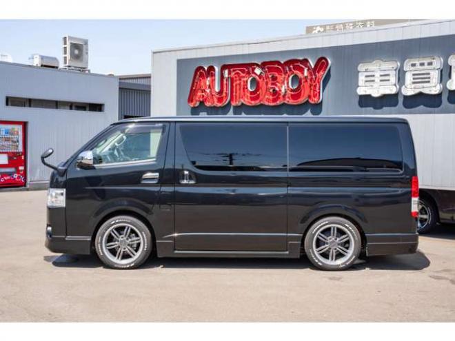 ハイエースバン2.8ダークプライム マルチロールトランスポータータイプIIロング ディーゼルターボ4WD　モデリスタフルエアロ・415COBRAバッドラッカー18インチAW・純正SDナビTV・Bカメラ・両側パワスラ・LEDライト・スマキー・AC100V・ベッドキット・エンスタ 2800