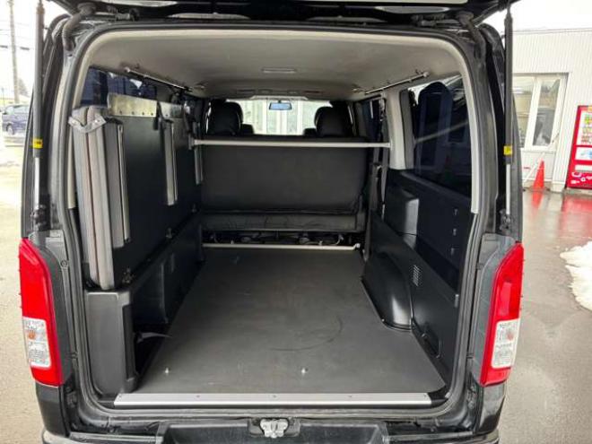 ハイエースバン2.8ダークプライム マルチロールトランスポータータイプIIロング ディーゼルターボ4WD　モデリスタフルエアロ・415COBRAバッドラッカー18インチAW・純正SDナビTV・Bカメラ・両側パワスラ・LEDライト・スマキー・AC100V・ベッドキット・エンスタ 2800