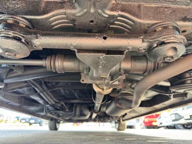 N-BOXカスタムG ターボSSパッケージ 4WD　プッシュスタート・横滑り防止・パドルシフト・クルーズコントロール・両側パワースライドドア・HIDオートライト・フォグランプ・オートエアコン・ETC・ミラーヒーター・純正フルセグTV・純正14incアルミホイール 660