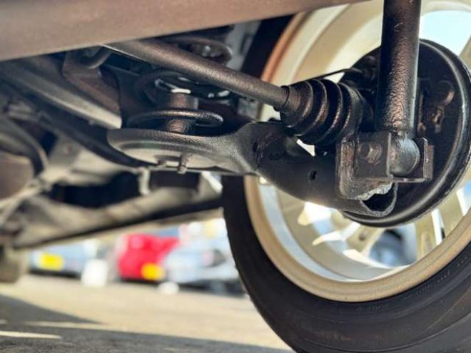 N-BOXカスタムG ターボSSパッケージ 4WD　プッシュスタート・横滑り防止・パドルシフト・クルーズコントロール・両側パワースライドドア・HIDオートライト・フォグランプ・オートエアコン・ETC・ミラーヒーター・純正フルセグTV・純正14incアルミホイール 660