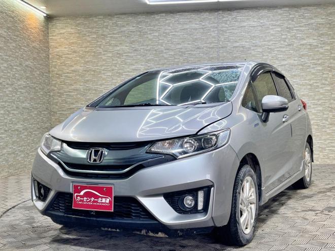 フィット1.5ハイブリッドSパッケージ 4WD 5年保証 スマキー ドラレコ ETC 自社認証工場 車検整備2年付 修復歴無 寒冷地仕様 禁煙