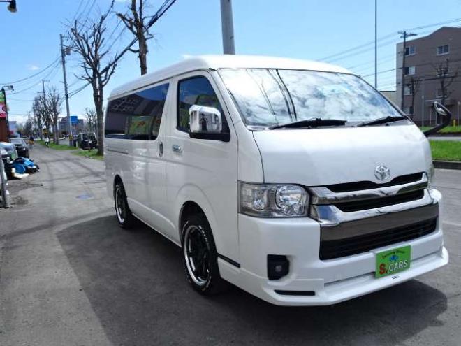 ハイエースバン2.7 スーパーGL ダークプライム ワイド ミドルルーフ ロングボディ 4WD　本州車　保証1年/走行距離無制限 4WD　後期仕様　モデリスタエアロ　両側パワースライドドア　舞杏KBレーシング2アルミホイール　ALPINE製ナビ　地デジ　バックカメラ　現行型ドアミラー　スマートキー ベットキット 2700