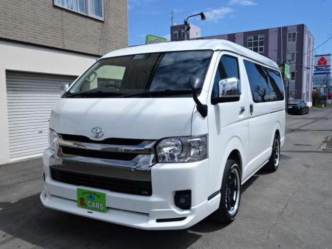 ハイエースバン2.7 スーパーGL ダークプライム ワイド ミドルルーフ ロングボディ 4WD　本州車　保証1年/走行距離無制限 4WD　後期仕様　モデリスタエアロ　両側パワースライドドア　舞杏KBレーシング2アルミホイール　ALPINE製ナビ　地デジ　バックカメラ　現行型ドアミラー　スマートキー ベットキット 2700