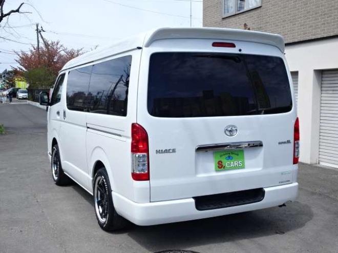 ハイエースバン2.7 スーパーGL ダークプライム ワイド ミドルルーフ ロングボディ 4WD　本州車　保証1年/走行距離無制限 4WD　後期仕様　モデリスタエアロ　両側パワースライドドア　舞杏KBレーシング2アルミホイール　ALPINE製ナビ　地デジ　バックカメラ　現行型ドアミラー　スマートキー ベットキット 2700