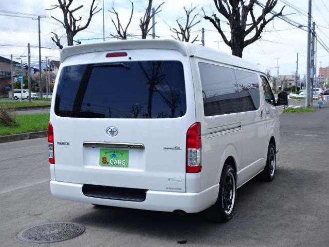 ハイエースバン2.7 スーパーGL ダークプライム ワイド ミドルルーフ ロングボディ 4WD　本州車　保証1年/走行距離無制限 4WD　後期仕様　モデリスタエアロ　両側パワースライドドア　舞杏KBレーシング2アルミホイール　ALPINE製ナビ　地デジ　バックカメラ　現行型ドアミラー　スマートキー ベットキット 2700