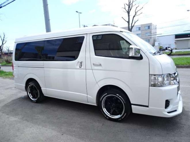 ハイエースバン2.7 スーパーGL ダークプライム ワイド ミドルルーフ ロングボディ 4WD　本州車　保証1年/走行距離無制限 4WD　後期仕様　モデリスタエアロ　両側パワースライドドア　舞杏KBレーシング2アルミホイール　ALPINE製ナビ　地デジ　バックカメラ　現行型ドアミラー　スマートキー ベットキット 2700