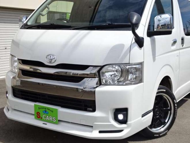 ハイエースバン2.7 スーパーGL ダークプライム ワイド ミドルルーフ ロングボディ 4WD　本州車　保証1年/走行距離無制限 4WD　後期仕様　モデリスタエアロ　両側パワースライドドア　舞杏KBレーシング2アルミホイール　ALPINE製ナビ　地デジ　バックカメラ　現行型ドアミラー　スマートキー ベットキット 2700