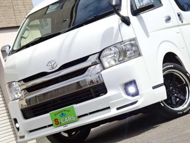 ハイエースバン2.7 スーパーGL ダークプライム ワイド ミドルルーフ ロングボディ 4WD　本州車　保証1年/走行距離無制限 4WD　後期仕様　モデリスタエアロ　両側パワースライドドア　舞杏KBレーシング2アルミホイール　ALPINE製ナビ　地デジ　バックカメラ　現行型ドアミラー　スマートキー ベットキット 2700