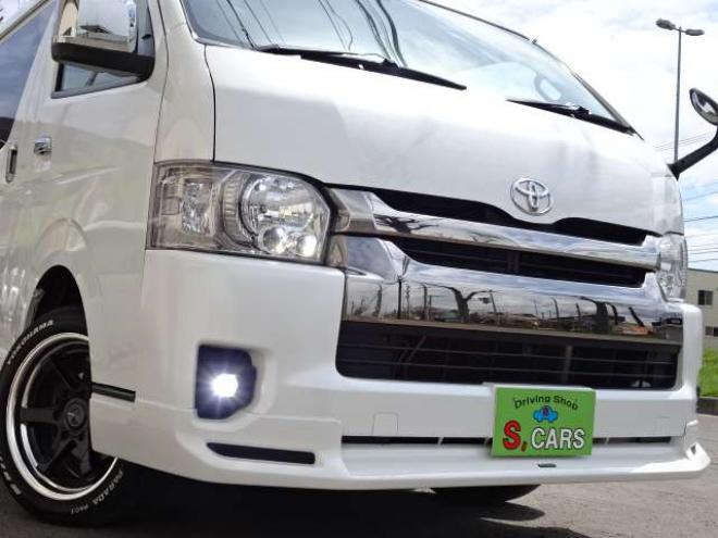 ハイエースバン2.7 スーパーGL ダークプライム ワイド ミドルルーフ ロングボディ 4WD　本州車　保証1年/走行距離無制限 4WD　後期仕様　モデリスタエアロ　両側パワースライドドア　舞杏KBレーシング2アルミホイール　ALPINE製ナビ　地デジ　バックカメラ　現行型ドアミラー　スマートキー ベットキット 2700