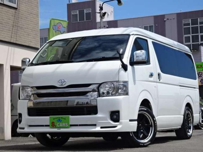 ハイエースバン2.7 スーパーGL ダークプライム ワイド ミドルルーフ ロングボディ 4WD　本州車　保証1年/走行距離無制限 4WD　後期仕様　モデリスタエアロ　両側パワースライドドア　舞杏KBレーシング2アルミホイール　ALPINE製ナビ　地デジ　バックカメラ　現行型ドアミラー　スマートキー ベットキット 2700