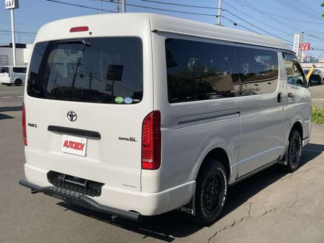 ハイエースバン2.7 スーパーGL ダークプライムII ワイド ミドルルーフ ロングボディ 4WD　TOYOオープンカントリーR/T215/65R16　ナイトロパワーM29スティンガー16インチAW　ワンオーナー　社外ナビTV　両側パワースライドドア　ETC　Pivot製クルコン　Tom's製テールライト　JAOS リヤスキッドバー 2700