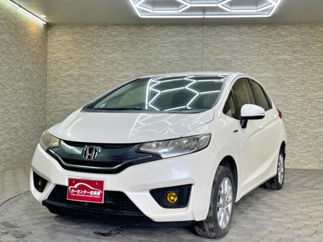 フィット1.5ハイブリッドFパッケージ 4WD 5年保証 スマキー ナビ Bカメ ETC 自社認証工場 車検整備2年付 寒冷地仕様 禁煙