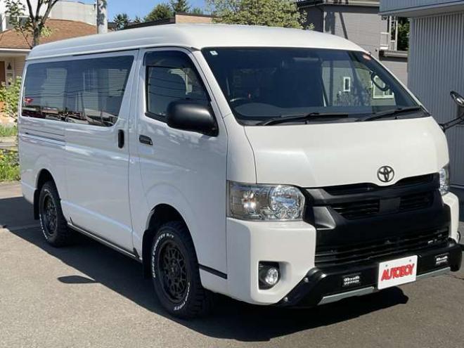 ハイエースバン2.7 スーパーGL ダークプライムII ワイド ミドルルーフ ロングボディ 4WD　TOYOオープンカントリーR/Tタイヤ　ナイトロパワーM29スティンガー16インチAW　ワンオーナー　両側パワースライドドア　ETC　Pivot製オートクルーズ付きスロコン　Tom's製テールライト　JAOS リヤスキッドバー 2700