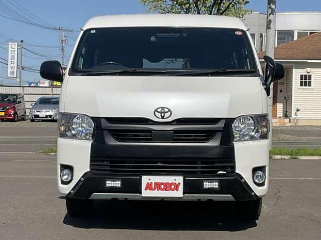 ハイエースバン2.7 スーパーGL ダークプライムII ワイド ミドルルーフ ロングボディ 4WD　TOYOオープンカントリーR/Tタイヤ　ナイトロパワーM29スティンガー16インチAW　ワンオーナー　両側パワースライドドア　ETC　Pivot製オートクルーズ付きスロコン　Tom's製テールライト　JAOS リヤスキッドバー 2700