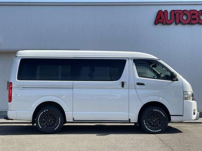 ハイエースバン2.7 スーパーGL ダークプライムII ワイド ミドルルーフ ロングボディ 4WD　TOYOオープンカントリーR/Tタイヤ　ナイトロパワーM29スティンガー16インチAW　ワンオーナー　両側パワースライドドア　ETC　Pivot製オートクルーズ付きスロコン　Tom's製テールライト　JAOS リヤスキッドバー 2700