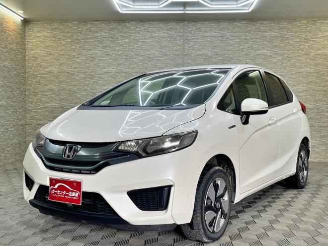 フィット1.5ハイブリッドFパッケージ 4WD 5年保証 スマキー ナビ ETC 自社認証工場 車検整備2年付 修復歴無 寒冷地仕様 禁煙