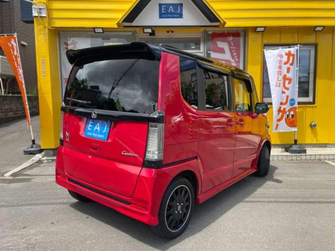 N-BOXカスタムG ターボ Lパッケージ 2トーンカラースタイル 4WD　1年保証/Bluetooth/ナビ・フルセグTV/バックカメラ/フルベッドキット/エンジンスターター/ETC/前後ドラレコ/キー2本/両側パワースライドドア/ハーフレザーシート/2トーンカラー/車検整備2年付き/法定整備/修復歴無し 660
