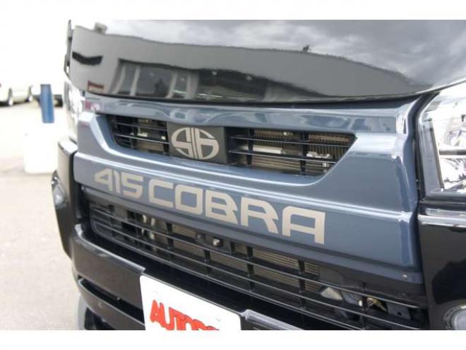 レジアスエース2.8 スーパーGL ダークプライム ロングボディ ディーゼルターボ 4WD　415COBRAオフィシャルコンプリート　ファントムヘッドライトシステム&新作HP-6　18インチホイール&フェイスリフトキット&フルエアロ&フローティングリップ&ローフォルムフェンダー　玄武2インチダウンブロック 2800