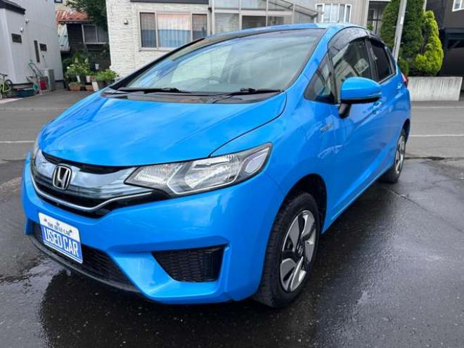 フィット1.5 ハイブリッド Fパッケージ 4WD　Gathersナビ　Bluetoothオーディオ　ワンセグTV　横滑り防止装置　12V180W　インテリジェントキー　バックモニター　スチールホイール冬 1500