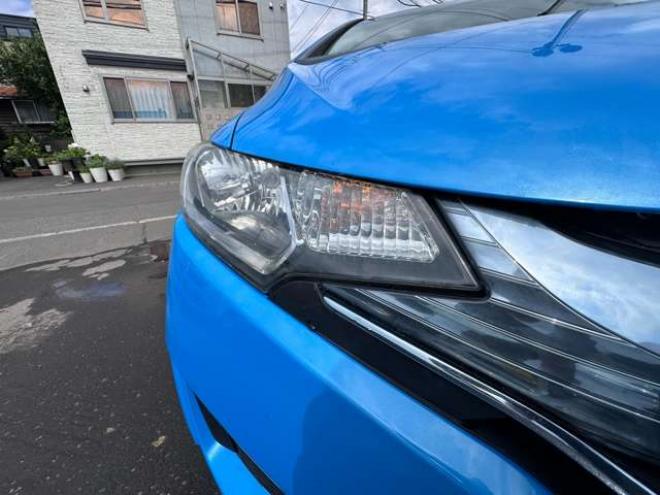 フィット1.5 ハイブリッド Fパッケージ 4WD　Gathersナビ　Bluetoothオーディオ　ワンセグTV　横滑り防止装置　12V180W　インテリジェントキー　バックモニター　スチールホイール冬 1500