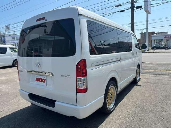 ハイエースバン2.7 スーパーGL ダークプライム ワイド ミドルルーフ ロングボディ 4WD　Pスタート スマートキー 両側スライドドア　OPLEDヘッドライト Fフォグ ハーフレザーシート 100V ベンチシート　ベッドキット リアクーラー ヒーター ステアリングスイッチ ディスプレイオーディオ　Bluetooth 2700