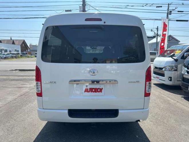 ハイエースバン2.7 スーパーGL ダークプライム ワイド ミドルルーフ ロングボディ 4WD　Pスタート スマートキー 両側スライドドア　OPLEDヘッドライト Fフォグ ハーフレザーシート 100V ベンチシート　ベッドキット リアクーラー ヒーター ステアリングスイッチ ディスプレイオーディオ　Bluetooth 2700