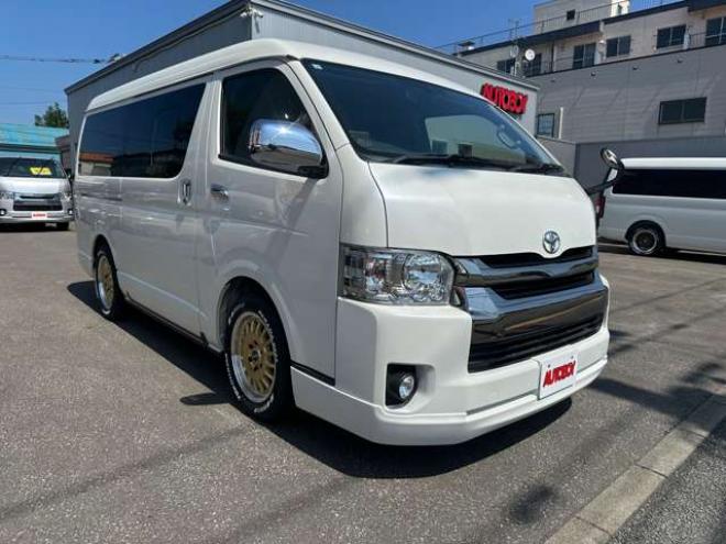 ハイエースバン2.7 スーパーGL ダークプライム ワイド ミドルルーフ ロングボディ 4WD　Pスタート スマートキー 両側スライドドア　LEDヘッドライト Fフォグ ハーフレザーシート 100V ベンチシート　ベッドキット リアクーラー ヒーター ステアリングスイッチ ディスプレイオーディオ　Bluetooth 2700