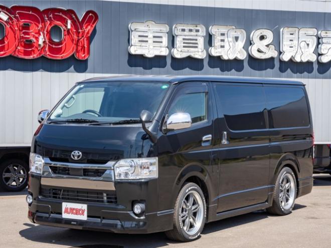 ハイエースバン2.8ダークプライム マルチロールトランスポータータイプIIロング ディーゼルターボ4WD　モデリスタフルエアロ・415COBRAバッドラッカー18インチAW・純正SDナビTV・Bカメラ・両側パワスラ・LEDライト・スマキー・AC100V・ベッドキット・エンスタ 2800