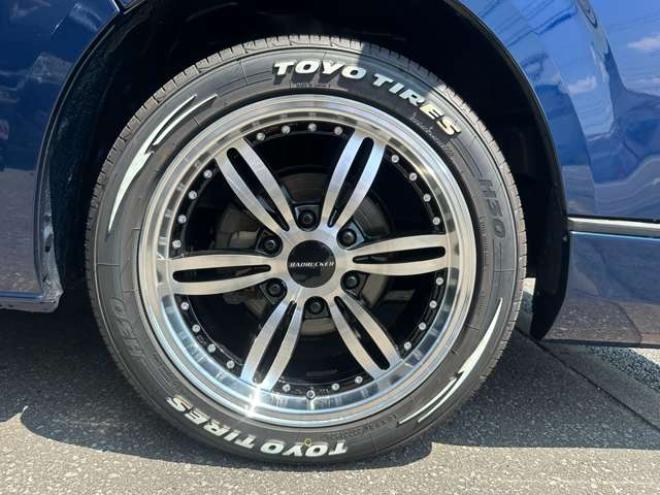 ハイエースバン2.8 DX ワイド スーパーロング ハイルーフ GLパッケージ ディーゼルターボ 4WD　2800ディーゼルターボ キーレス AC100V ベンチシート ETC 電動格納ミラー リアヒータークーラー BIGX11インチ バックカメラ　Bluetooth フルセグTV 純正エンスタ BADRUCKE18in　TOYO　H30ホワイトレター Fスポイラー 2800